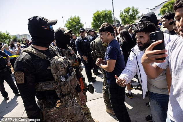 Liberal Los Angeles residents were outraged as ICE agents with bulletproof vests spent the Fourth of July holiday continuing to carry out Donald Trump's mass deportation promise