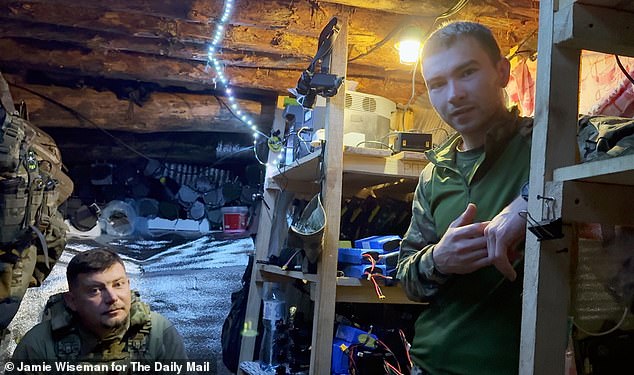 In Eastern Ukraine, Pendlebury and Wiseman accompany troops to watch their new weapon in action. 'Puma' and Richard's military escort Stas are pictured