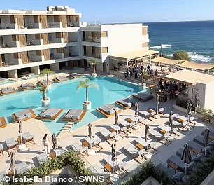 Holidaymakers were left stunned as they watched a 'stampede' unfold for prime sunbed spots at a popular five star hotel in Crete - sparked by influencers who wanted to take selfies 'all day' on them (Pictured: before the rush)