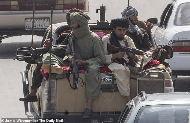 Victorious Taliban fighters patrolling the streets of Kabul, using vehicles, weapons and often uniform seized from the Afghan National Army and police
