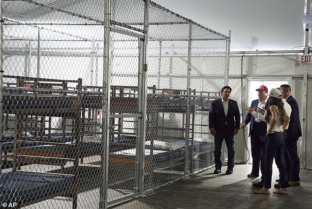 Reports indicate dire conditions for both detainees and staff at the new migrant detention facility in Florida, called Alligator Alcatraz. Pictured: President Donald Trump, Governor Ron Desantis and DHS Secretary Kristi Noem touring the facility last week
