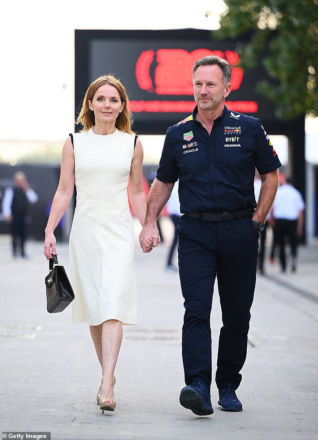The couple stride into the Bahrain circuit paddock hand in hand in March last year following an investigation into Christian Horner's 'inappropriate behaviour' with a female worker