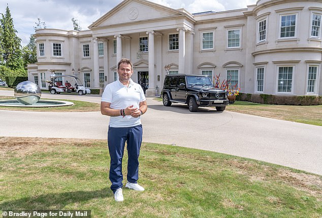 Russian Tycoon Dmitry Tsvetkovin, 45, pictured in front of his mansion, Dawn Hill - a stunning ten-bedroom home on the exclusive Wentworth estate in Surrey