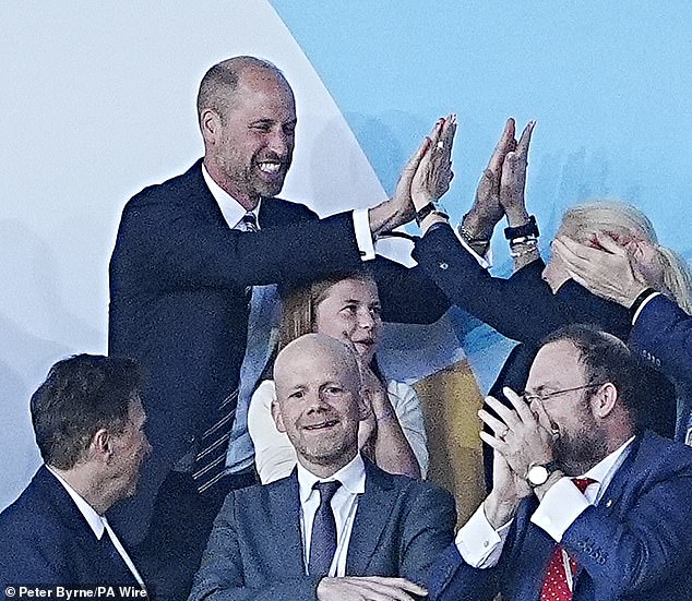 Chloe Kelly's winning penalty sent Prince William and Princess Charlotte berserk in the stands (pictured)
