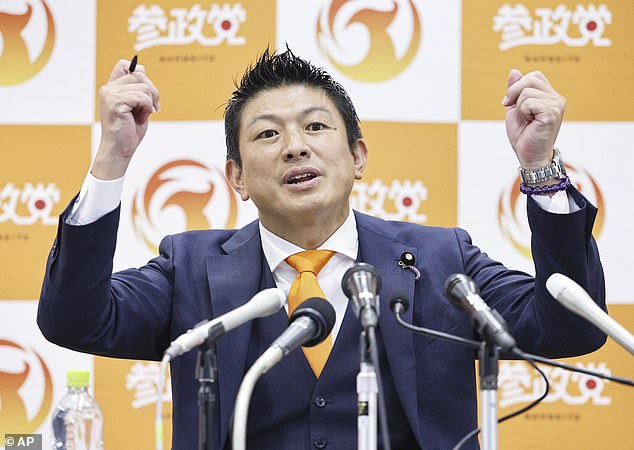 Sohei Kamiya, leader of Sanseito party speaks to the media following the upper house election in Tokyo, Sunday, July 20, 2025