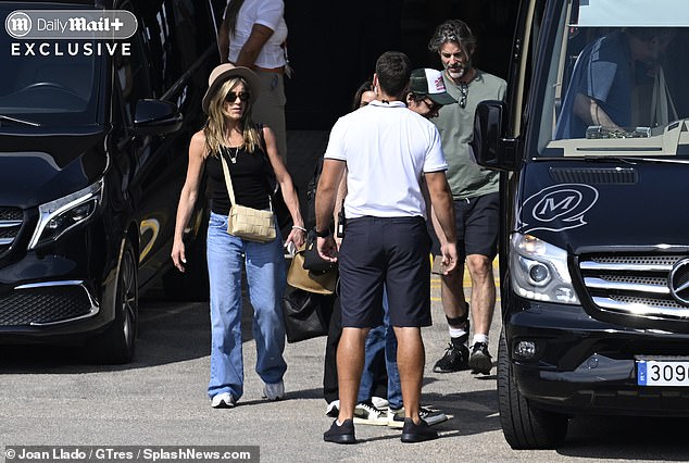 After years of romantic woes, Jennifer Aniston might have turned to an unconventional new method to find love - she has been spotted with life coach and love guru Jim Curtis