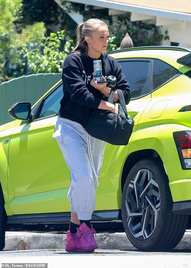 JoJo Siwa has sparked speculation about a permanent move to the UK, as she shared her sadness at flying back to the US after spending the week with boyfriend Chris Hughes