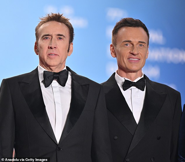 Beloved Australian actor Julian McMahon has p[assed away, aged 56. Pictured with The Surfer co-star Nicholas Cage in May 2024