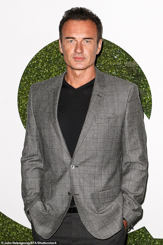 Heartbreaking new details have emerged in Nip/Tuck star Julian McMahon's cause of death days after his shock passing aged 56 - pictured 2015