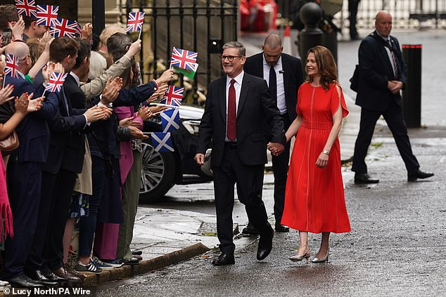 Sir Keir Starmer arrives with his wife Victoria at Downing Street after his victory last year