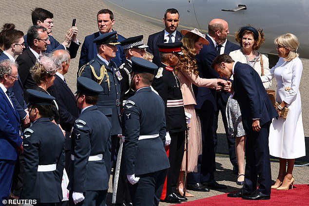 Emmanuel and Brigitte Macron are greeted by William and Kate at RAF Northolt this morning