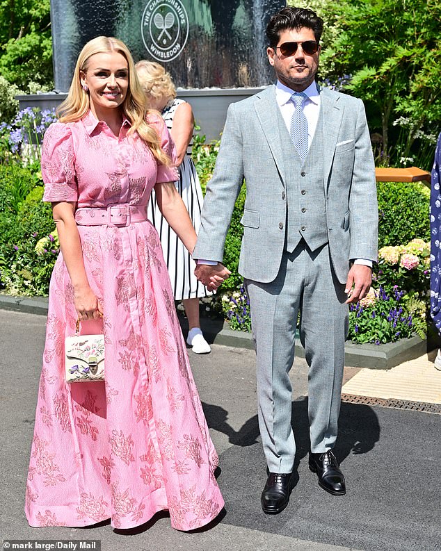 Katherine Jenkins was hand-in-hand with husband Andrew Levitas as she arrived at Wimbledon on Tuesday morning