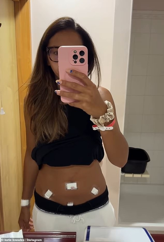 Katie shared the news to her Instagram on Friday, posting videos of herself post-operation