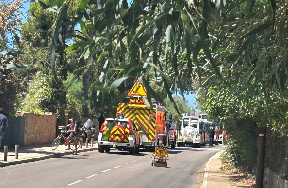 Emergency vehicles on a residential street.