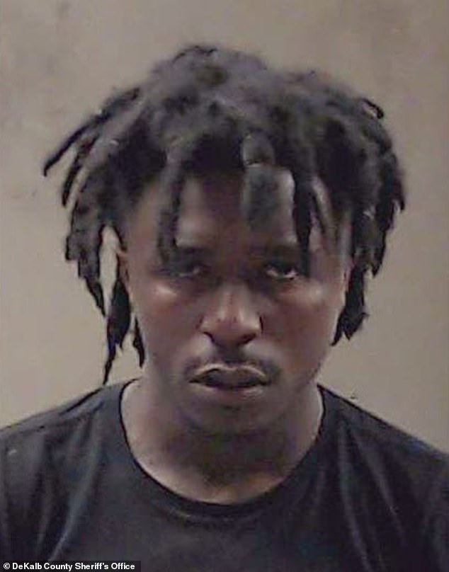 Taco Nash (pictured), 25, was forcibly removed from the courtroom following the vile outburst after a DeKalb County jury found him guilty of killing 22-year-old Mi'ckeya Montgomery