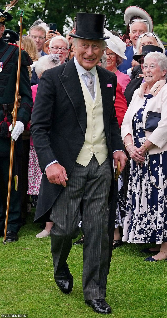 King Charles appeared cheerful as he joined the Sovereign's Garden Party at the Palace of Holyroodhouse in Edinburgh today