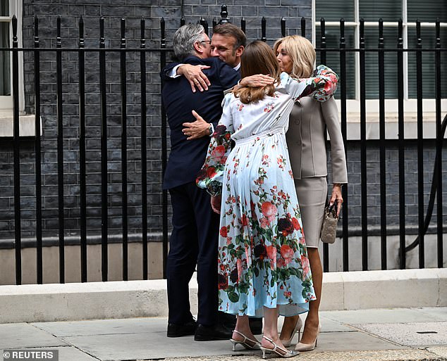 The Prime Minister and Lady Victoria beamed as they hugged the president and his wife Brigitte, ahead of a meeting in No10 this afternoon.