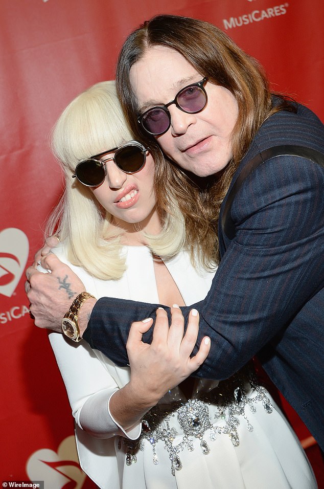 The pop star pictured with the Black Sabbath frontman in 2014