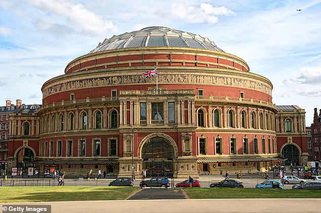 Three Royal Albert Hall seat holders are suing the charity behind the venue for more than £500,000 in damages at the High Court over allegations it 'unlawfully' deprived them of their rights to their places