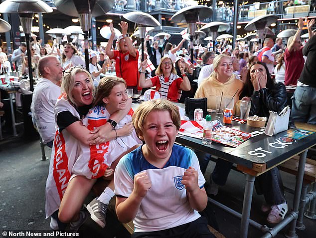 A peak live audience of 12.2million people watched the Women's Euro final on the BBC - with the total set to be topped up with ITV viewers (pictured: fans watching at Boxpark Croydon)