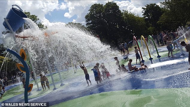 Man has been charged with two counts of attempted kidnapping after allegedly approaching multiple children at the splash pad in Victoria Park, Cardiff (pictured)