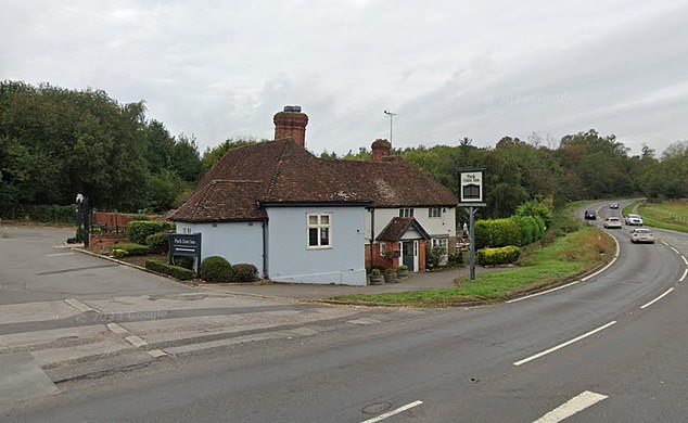Police surrounded the Park Gate Inn in Hollingbourne, Kent last night, after armed cops reportedly shot a man