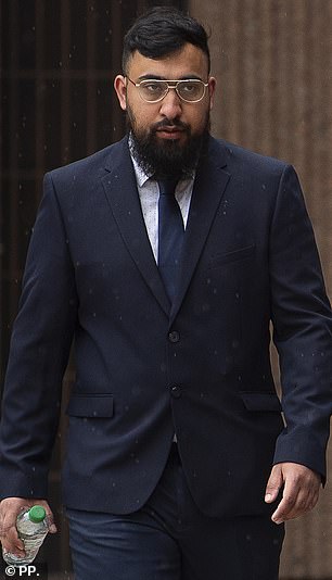 Muhammad Amaad, 26, arriving at Liverpool Crown Court where he told a jury he fought back against an armed policeman because he thought he was 'choking' his brother