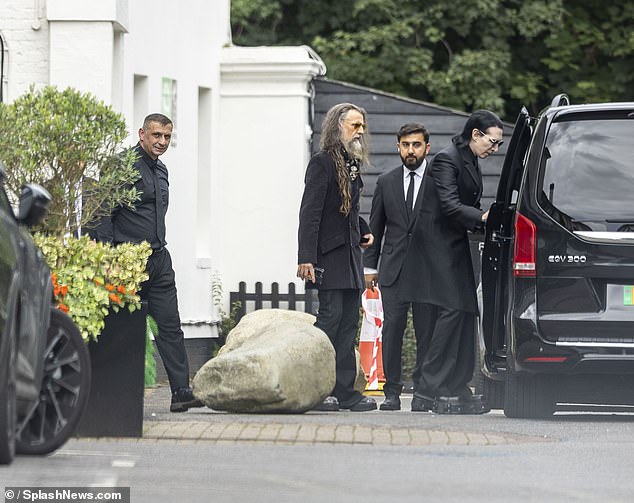 Marilyn Manson (right) attended the private service this afternoon, alongside Ozzy's lead guitarist Zakk Wylde (centre)