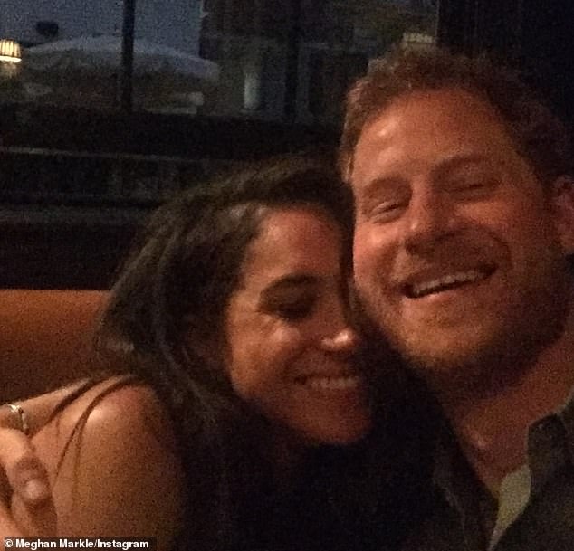 Meghan Markle has posted a loved-up snap alongside husband Prince Harry as she gushed over their kids on Fourth of July