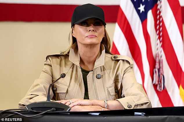Melania Trump, 55, delivered an emotional tribute to the victims of the deadly Texas floods, revealing a charm bracelet she received from survivors at Camp Mystic. Pictured: Melania Trump wears a bracelet that she received to honor the victims of flood at Camp Mystic