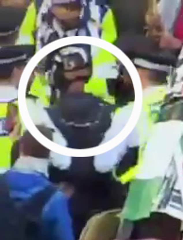 Metropolitan Police officers spotted a man at a pro-Palestine protest in Whitehall wearing what appeared to be a parachute - interpreted as support for Hamas terrorists who used paragliders to enter Israel from Gaza during the October 7 attack