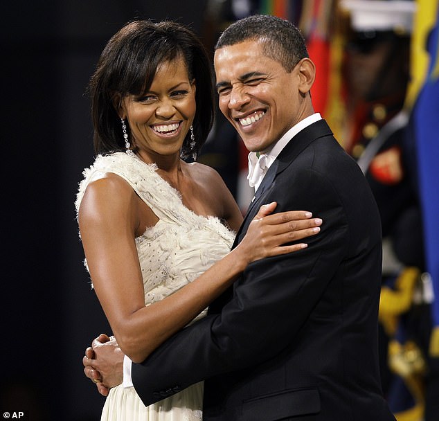 The Obamas met in 1988 when the future president took a job at a law firm in Chicago for the summer where Michelle was already working. Pictured in 2009