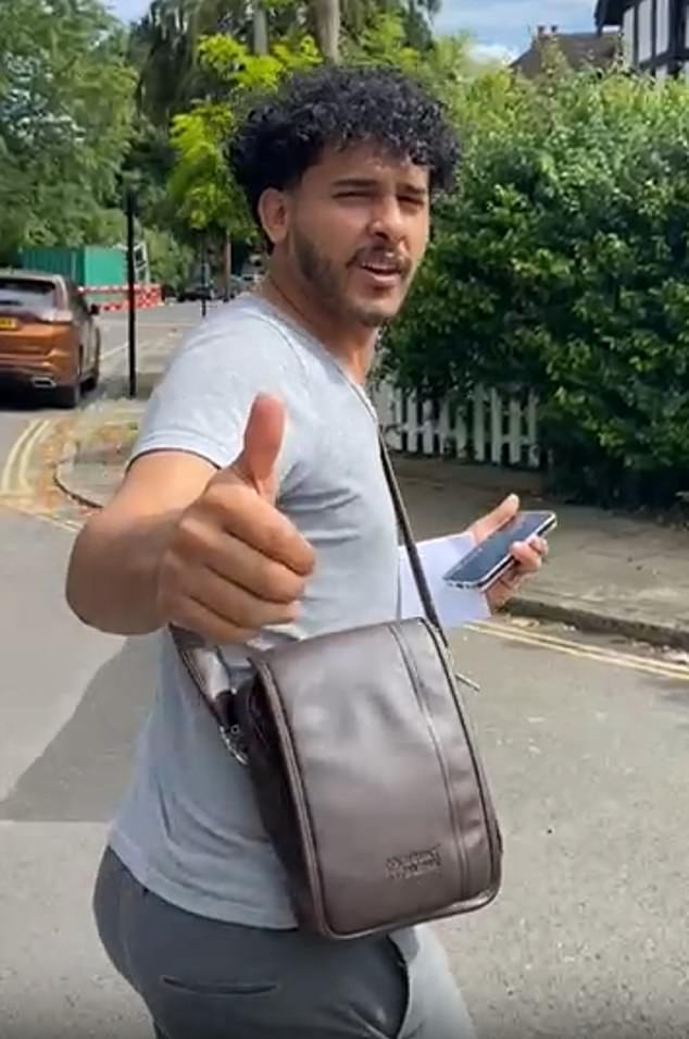 A migrant caught with vile child abuse videos on his phone gave a thumbs up outside court after a judge spared him jail
