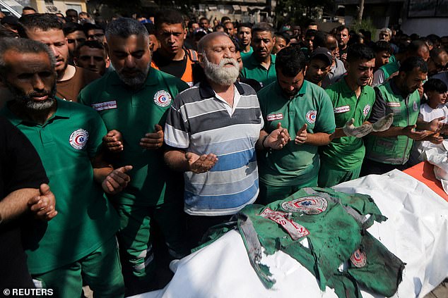 Channel 4 will show a new documentary about medics in Gaza after it was scrapped by the BBC over bias concerns. Pictured: The funeral of medics in Gaza on June 10