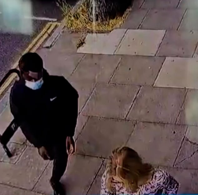 Dramatic CCTV footage shows Emma Van Der Hoek looking down at her phone along a straight path, when a man comes up behind her