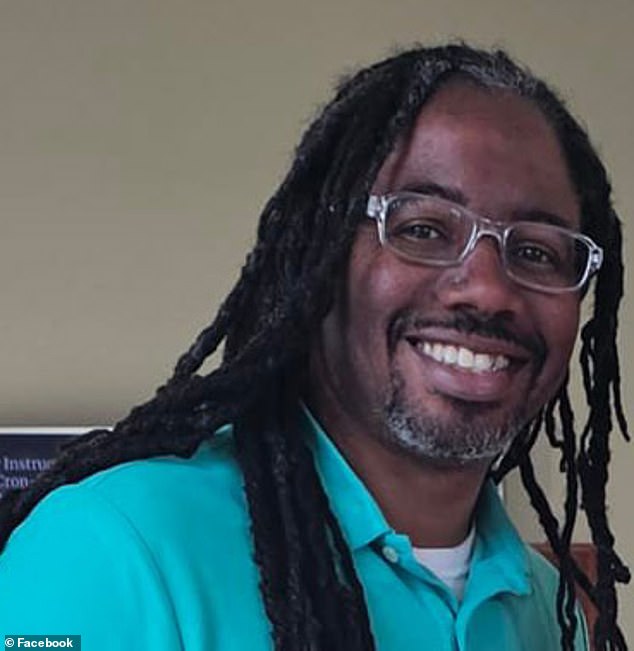 The hero, identified as former Marine Derrick Perry, pulled out a concealed weapon and held knifeman Bradford James Gille at gunpoint until officers arrived at the scene