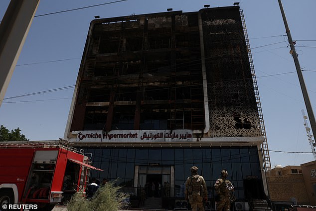 Officials have launched an investigation into the blaze at the newly-opened six-storey Corniche Hypermarket Mall in the city of Kut