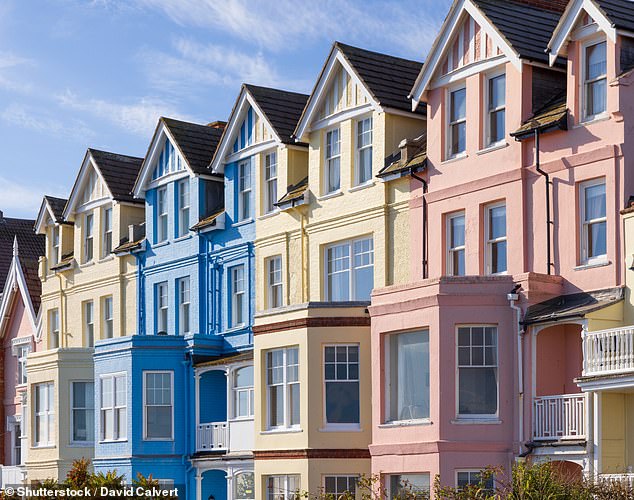 Wake-up call: Hundreds of thousands of households face a remortgaging shock and will need to fork out hundreds of pounds more per month to keep their home
