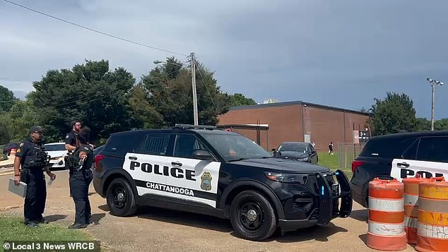 Cop cars have now filled the area, with police officers telling the public to stay away for the time being