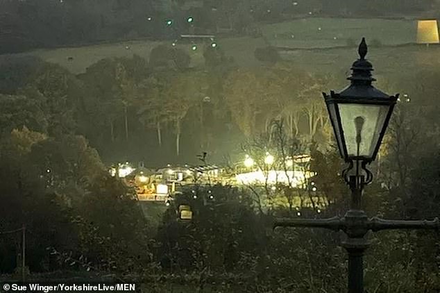 A neighbour has hit out at a canopy which lights up "like Blackpool Illuminations" at night - but the farmer who owns it says she's done nothing wrong