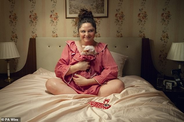 Netflix viewers are hooked on Lena Dunham's new romance comedy, Too Much, with some even binge-watching all ten episodes (Megan Stalter pictured)
