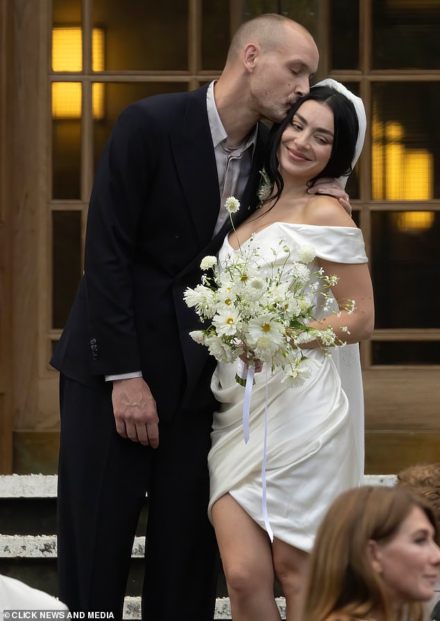 Charli XCX, 32, has revealed emotional husband George Daniel, 35, cried during their intimate wedding at Hackney Town Hall on Saturday