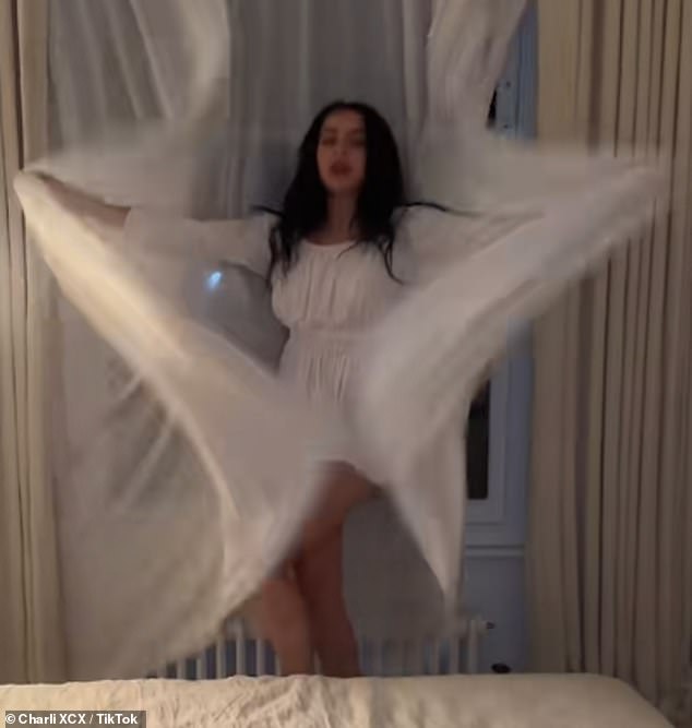 She changed into a second white dress, this time from Nova Cora and costing a cool £3,300, as she celebrated her newlywed status with pals