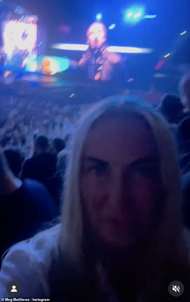 Meg Matthews sang the night away as Oasis took to the stage for their first reunion show in Cardiff on Friday