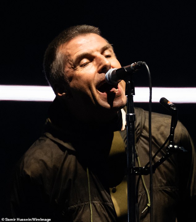 An Oasis fan went viral after she was spotted having to use app Shazam to identify 'one of the greatest songs of all time' during the band's opening gig in Cardiff on Friday