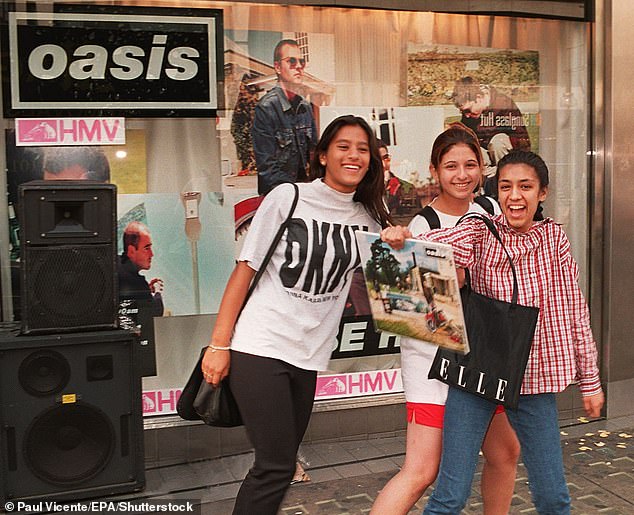 Another snap showed excited teenage girls with their copy of Be Here Now in 1999, as fans all over Britain queued to get their copy of the eagerly awaited album