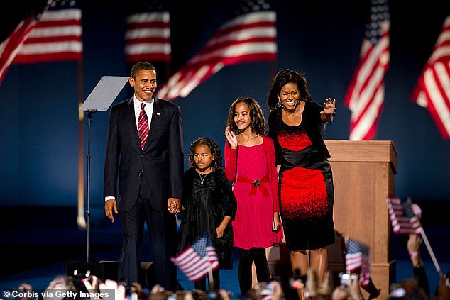 Obama has two daughters with his wife Michelle. (Pictured: the couple and their daughters Sasha and Malia at Chicago's Grant Park when they became the new first family in 2009)