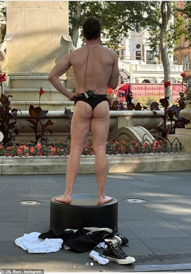 The former X Factor star, 41, shared a picture of himself taking off his clothes in the capital following the release of his new single Save Me