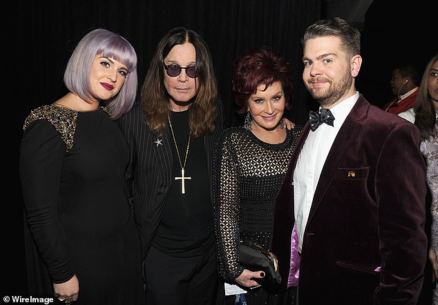 Kelly, Ozzy, Sharon and Jack Osbourne pictured at the Grammy Awards in 2014