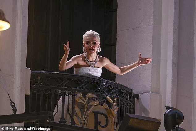 The 5ft 2in, 24-year-old Zegler may be a diminutive diva, but with a delicate yet rich voice, she takes to the role of the Latin American political idol like a pair of Ferragamo shoes. Pictured: Performing "Don't Cry For Me Argentina" during the West End Opening Night of "Evita" on the balcony at the London Palladium